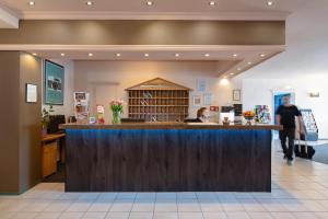 Nápoje v ubytování Hotel Berliner Bär
