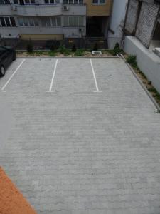 a parking lot with a bunch of parking spaces at Apartments Center KG in Kragujevac