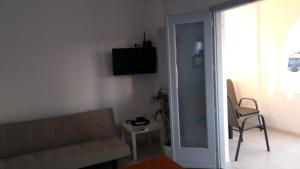 TV o dispositivi per l'intrattenimento presso Daylight Hotel