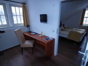 Postel nebo postele na pokoji v ubytování Hotel Goldene Krone