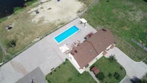 an overhead view of a house with a swimming pool at Gogol Hotel in Myrhorod