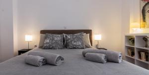 Posteľ alebo postele v izbe v ubytovaní Athenian Apartment