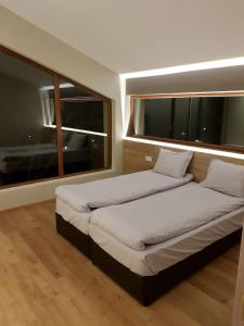 מיטה או מיטות בחדר ב-Mihaylova kushta