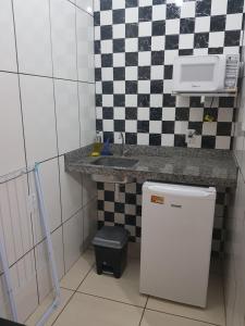 Kuchyň nebo kuchyňský kout v ubytování Pousada Gil