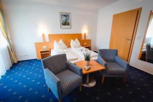 Letto o letti in una camera di Gasthof Oberer Gesslbauer