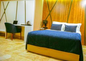 Postel nebo postele na pokoji v ubytování Extenso Hotel