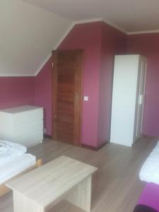 Postel nebo postele na pokoji v ubytování Pokoje i domki Monika