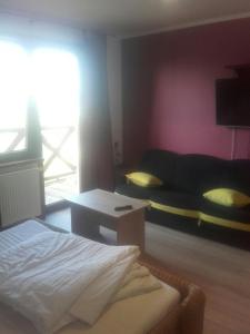 Postel nebo postele na pokoji v ubytování Pokoje i domki Monika