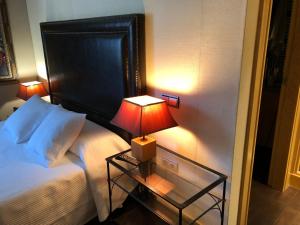 A bed or beds in a room at Las Hortensias