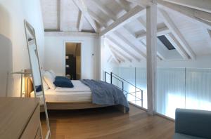Posteľ alebo postele v izbe v ubytovaní The Bridge Casa Luxury Apartments