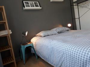 Voodi või voodid majutusasutuse Chalet du Doumet - Appart LUZ centre - parking et garage individuel ferme - draps et serviettes inclus toas