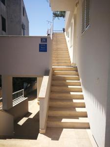a stairway leading up to a building at Apartment Neven in Makarska