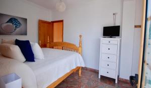 Cama o camas de una habitación en Beach Holiday Home Fue