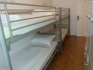 A bed or beds in a room at CH-Hostel