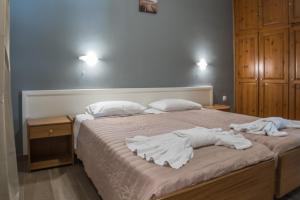 A bed or beds in a room at Chandris Apartments