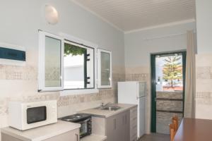 A kitchen or kitchenette at Chandris Apartments