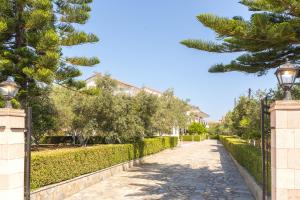 A garden outside Chandris Apartments