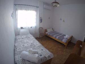 Ένα ή περισσότερα κρεβάτια σε δωμάτιο στο Dia's Home