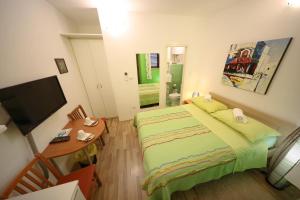 Posteľ alebo postele v izbe v ubytovaní Rooms Goga