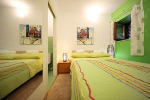 Posteľ alebo postele v izbe v ubytovaní Rooms Goga