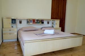 Postel nebo postele na pokoji v ubytování Mimino Guest House