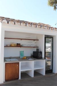 Ett kök eller pentry på B&B Casa Luz del Sur, adults only