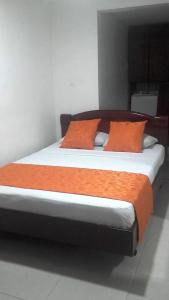 Postel nebo postele na pokoji v ubytování Hotel Center