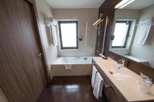 Koupelna v ubytování Hotel Aroi Ponferrada