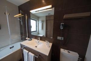 Koupelna v ubytování Hotel Aroi Ponferrada