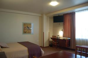 Μια τηλεόραση ή/και κέντρο ψυχαγωγίας στο Hotel El Molino Riobamba