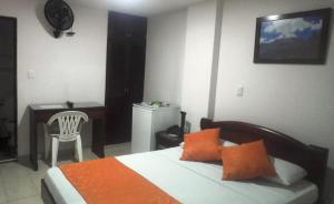 Postel nebo postele na pokoji v ubytování Hotel Center