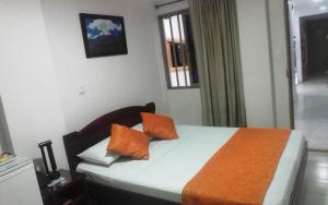 Postel nebo postele na pokoji v ubytování Hotel Center