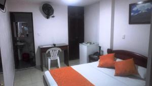 Postel nebo postele na pokoji v ubytování Hotel Center