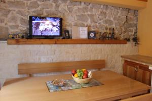 TV a/nebo společenská místnost v ubytování Guest House Ankora