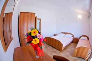 Postel nebo postele na pokoji v ubytování Apartments Stanka