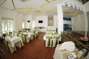TV o dispositivi per l'intrattenimento presso Virtue Highland Hotel