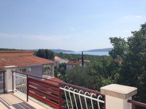 a view from the balcony of a house at Apartments Jelusic in Pinezici