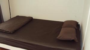 En eller flere senge i et værelse på BIGJOY INN Hirokouji