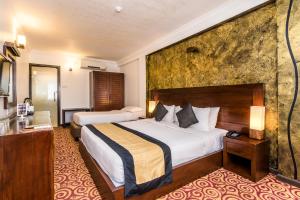 Gulta vai gultas numurā naktsmītnē Ceylon City Hotel,Colombo