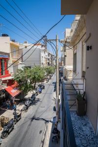 a view of a city street from a balcony at Yasemi Studio 1 in Heraklio