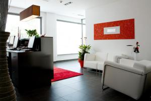 TV a/nebo společenská místnost v ubytování Hotel Napoleon