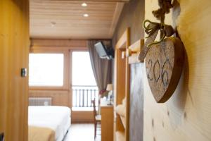 Postel nebo postele na pokoji v ubytování Hotel Funivia