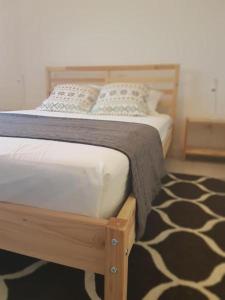 Posteľ alebo postele v izbe v ubytovaní Refúgio