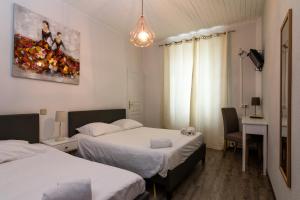 Postel nebo postele na pokoji v ubytování Ma Petite Auberge