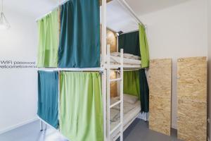 Posteľ alebo postele v izbe v ubytovaní Avenue Hostel