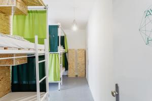 Posteľ alebo postele v izbe v ubytovaní Avenue Hostel