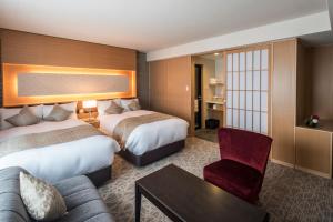 Voodi või voodid majutusasutuse Kyoto Shinmachi Rokkaku Hotel grandereverie toas