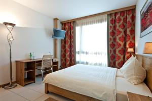 Postel nebo postele na pokoji v ubytování Hotel Station + 37 fotografií