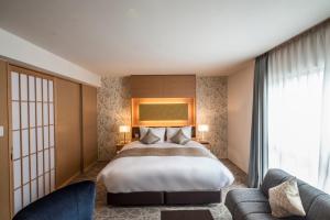 Voodi või voodid majutusasutuse Kyoto Shinmachi Rokkaku Hotel grandereverie toas +37 fotot