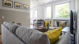 Televízia a/alebo spoločenská miestnosť v ubytovaní A+ apartament Rajska